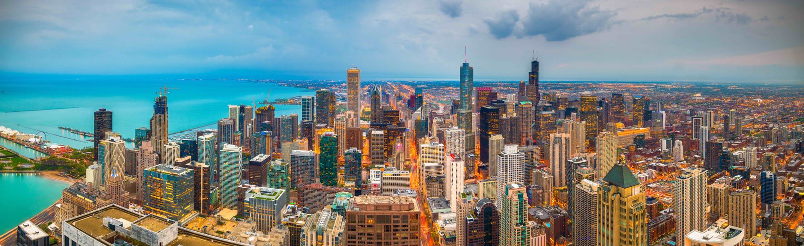 Panorama of the Chicago skyline and lakefront under a storm sky